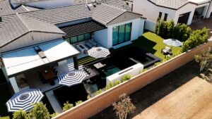 Aerial view of Arizona backyard oasis with custom pool and patio in Mesa